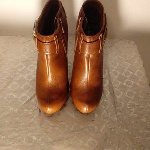 Women's Ankle high heels boots.